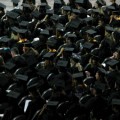 Graduates In Black Cap